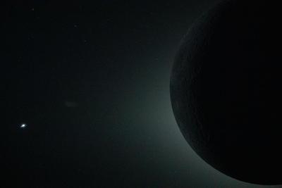 Moon dark side with solar corona